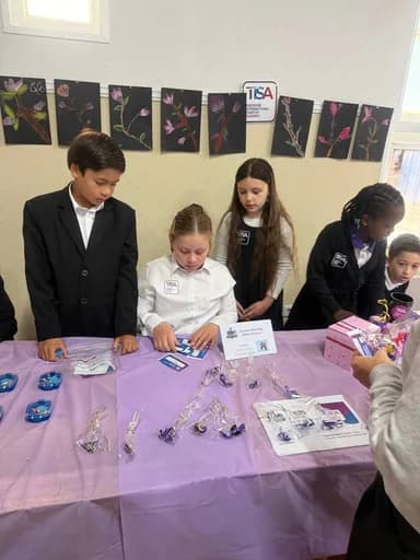 TISA Business students selling their own products at a market stall